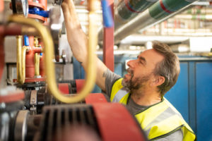 Worker tightening screw